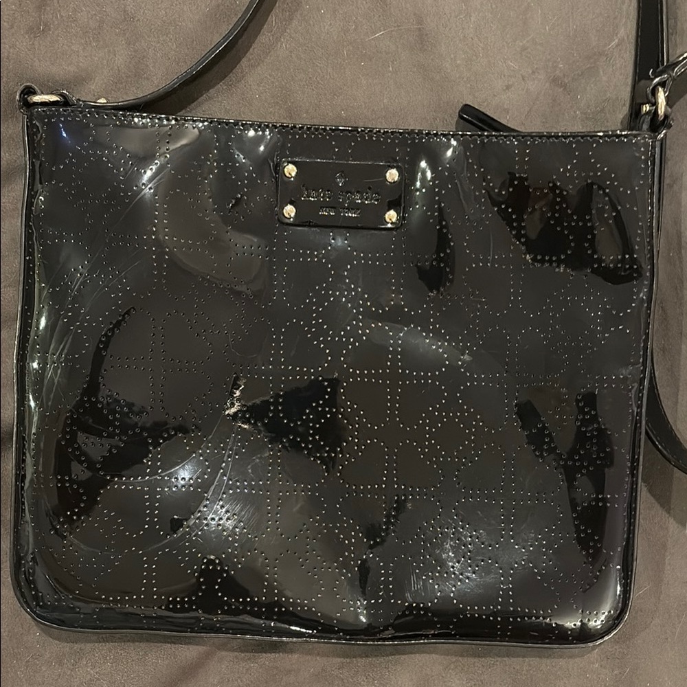 Kate Spade patent file style crossbody bag with clover detail